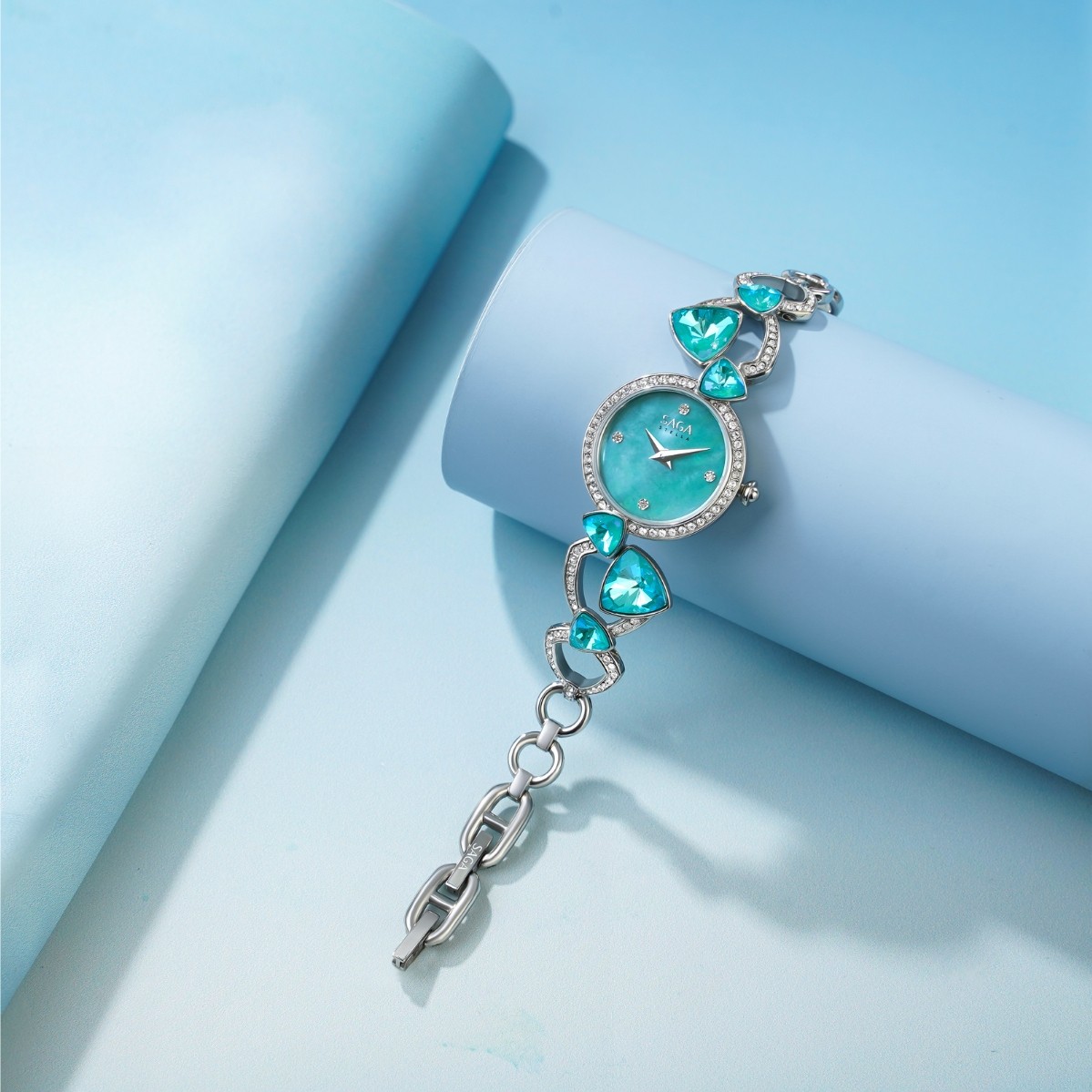 Saga Fly of a Kite 53767-SVLGLG-2 – Nữ – Kính cứng - Quartz (Pin) – Mặt số 24mm, Khảm xà cừ, đính đá Swarovski 8 Đồng hồ Saga 53767-SVLGLG-2 khảm xà cừ